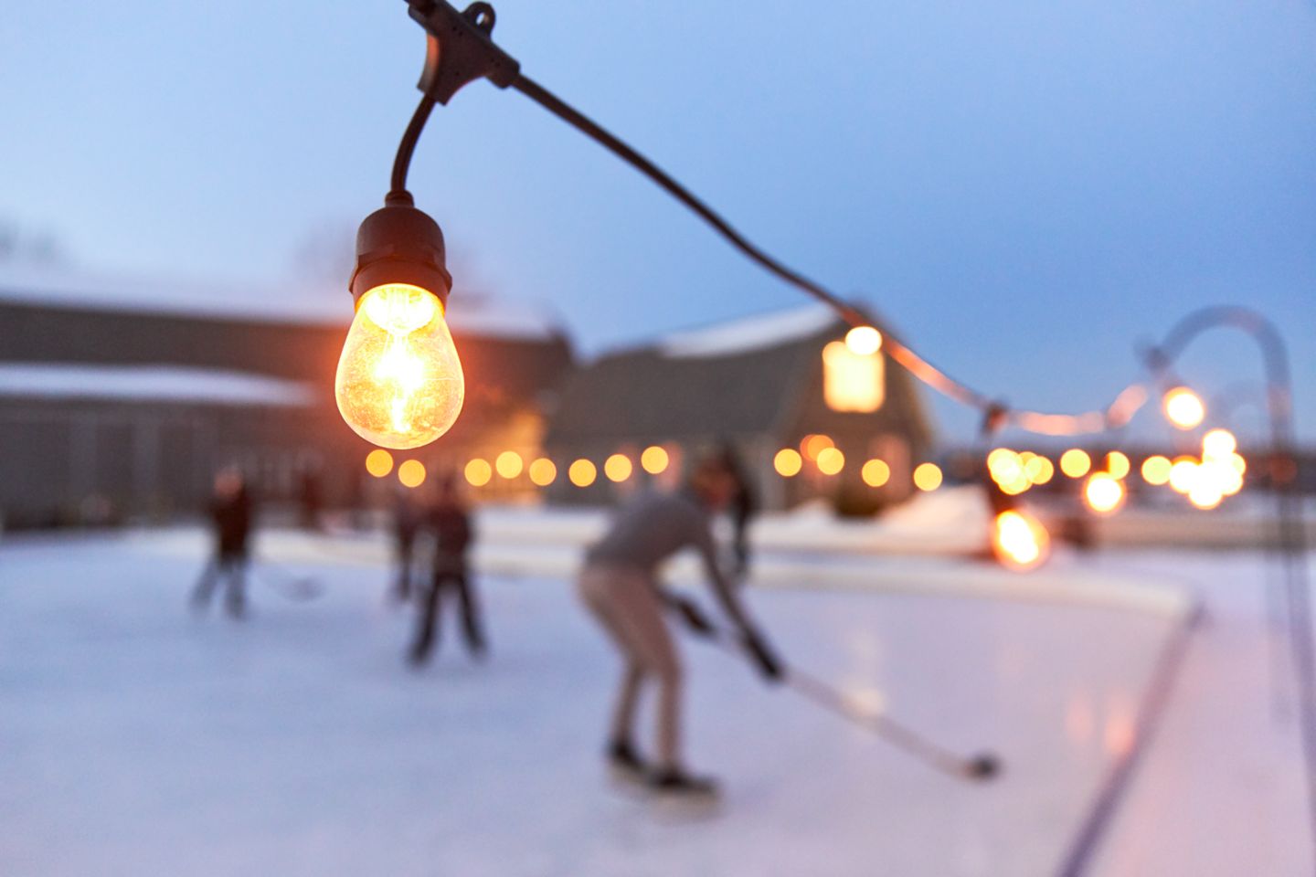 playing hockey under twinkle lights