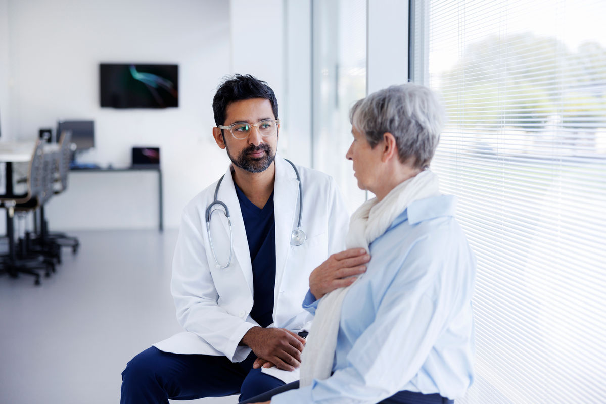 Provider and patient sitting down talking about results