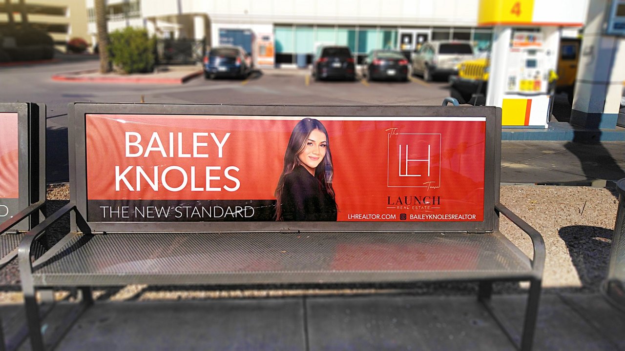 Bench advertising for Bailey Knoles realtor on Lamar Advertising inventory