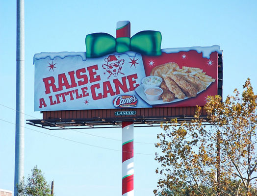 Raising Cane's Christmas billboard on Lamar Advertising inventory