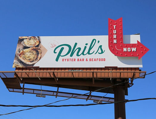 Phil's Oyster Bar & Seafood billboard on Lamar Advertising inventory