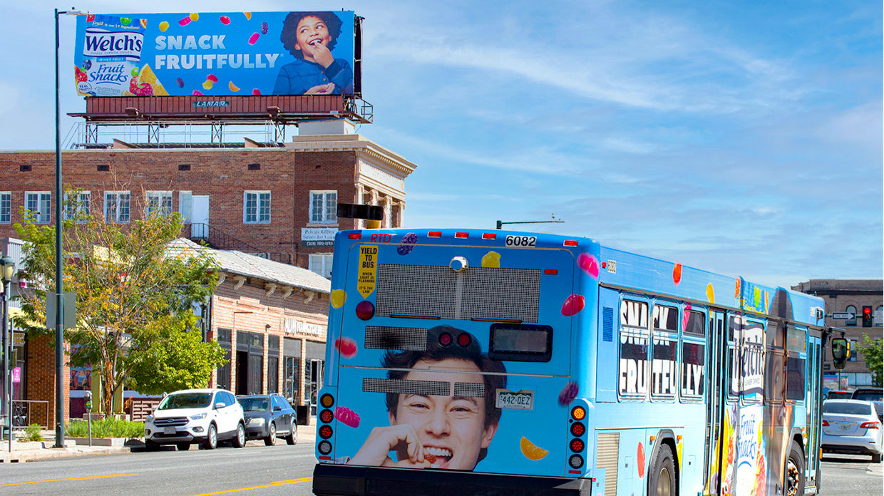 Lamar Advertising and Welch’s bulletin and bus exterior advertisement