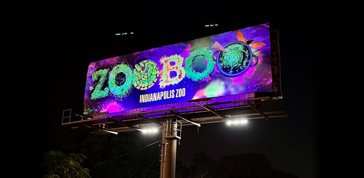 The Indianapolis Zoo used a colorful, Halloween-themed billboard to promote its ZooBoo event.