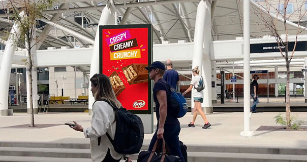 Kiosk advertisement for KitKat on Lamar Advertising inventory in Denver