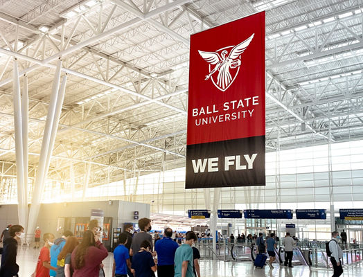 Lamar Advertising and Ball State University hanging banner at Indianapolis Airport