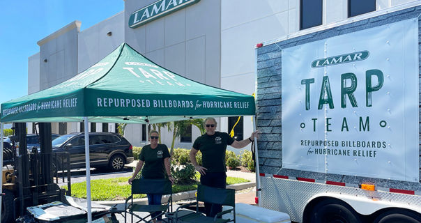 Lamar advertising's Tarp Team handing out repurposed tarp for hurricane relief