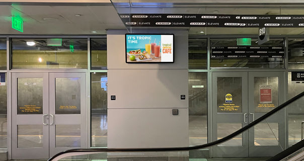 Digital airport gate advertisement for Tropical Smoothie Cafe in Denver airport on Lamar Advertising inventory