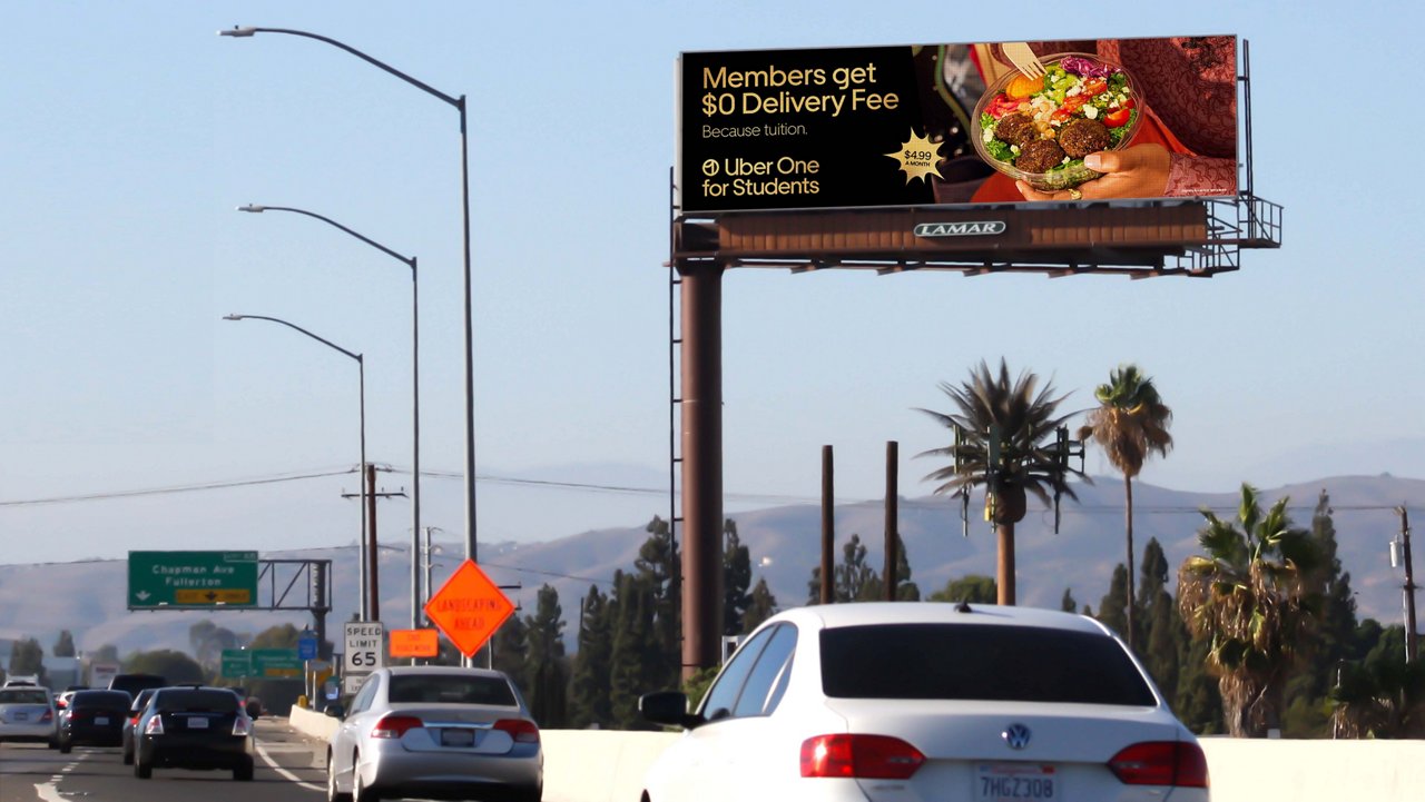Uber student discount ad on a lamar digital billboard