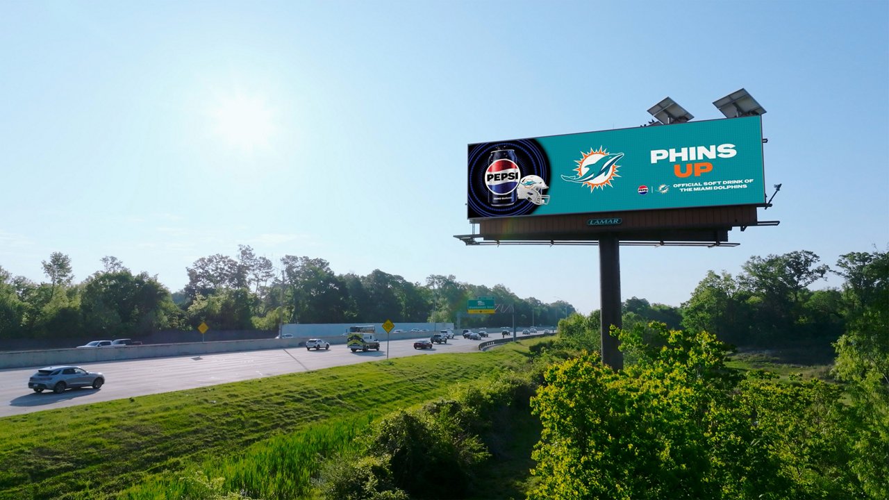 Pepsi Miami Dolphins creative on lamar digital billboard