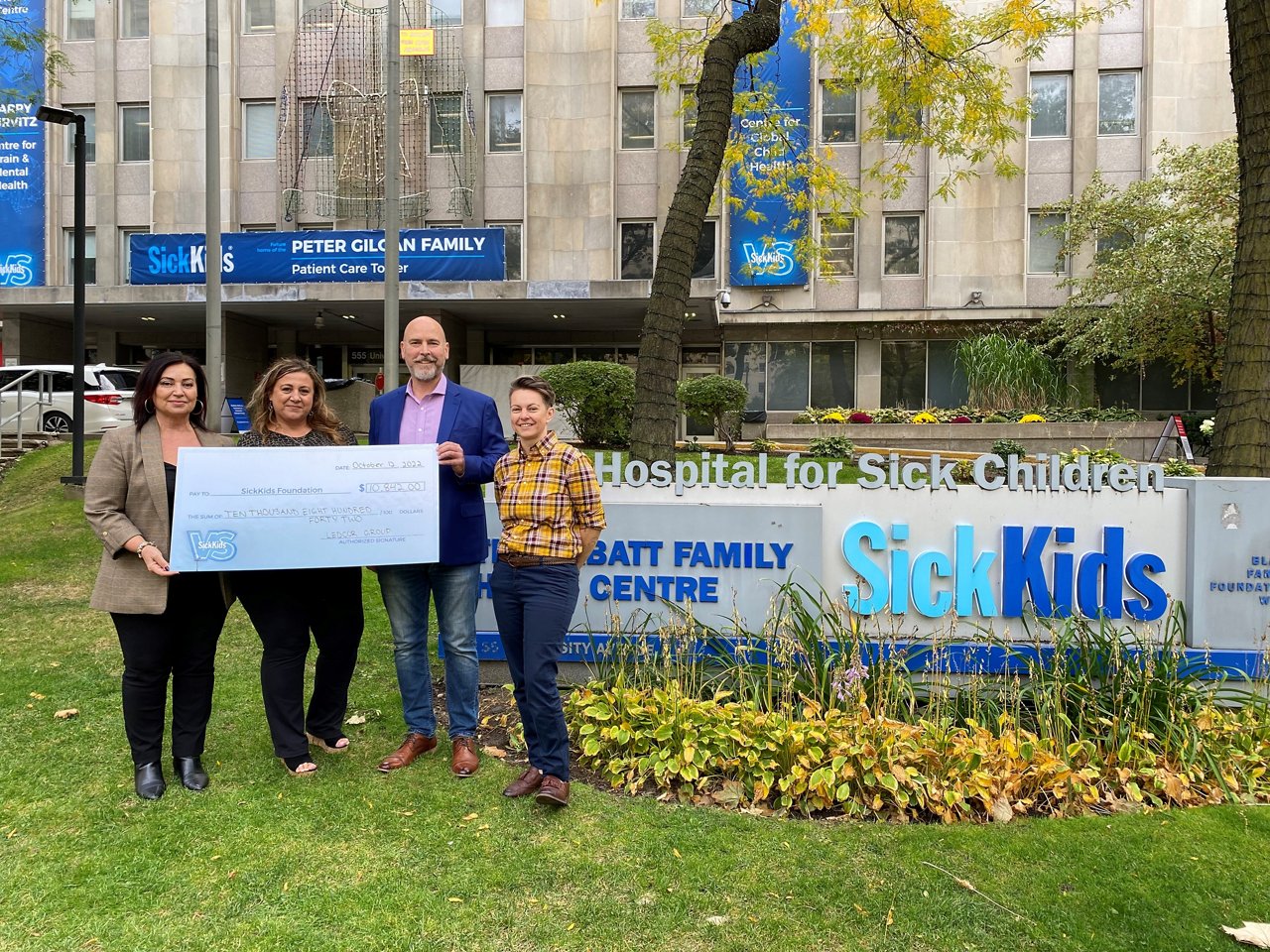 ledcor employees donating money to Sick Kids.