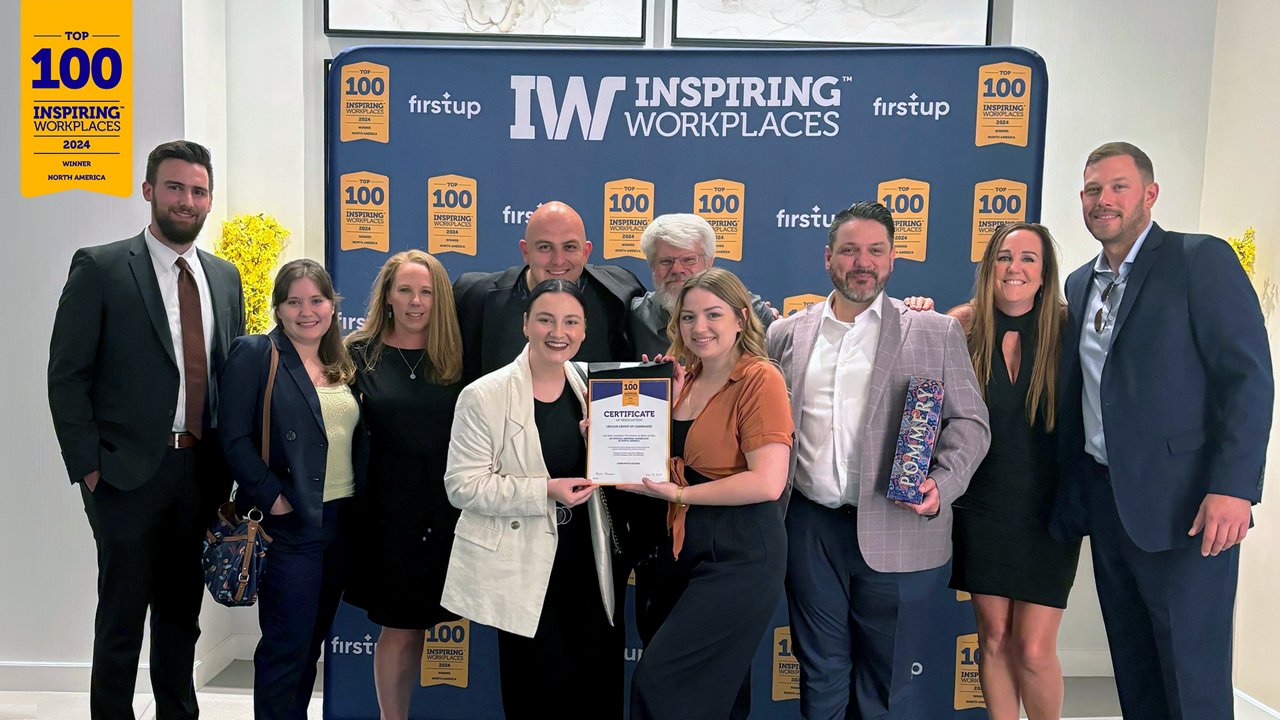 A group of Ledcor employees receiving the Top 100 Inspiring Workplaces for 2024 Award