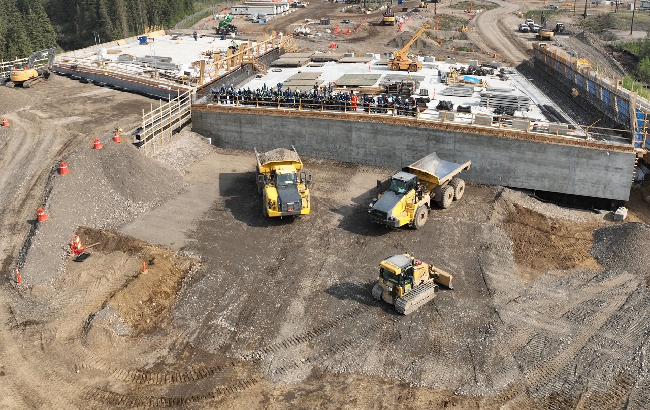 Aerial view of site with crew members.