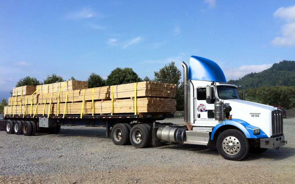 Truck loaded with wood.