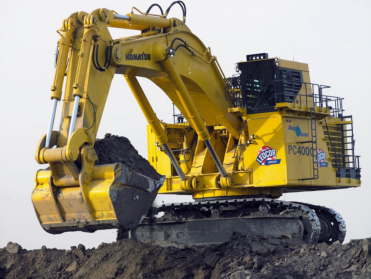 Excavator dumping the soil. 