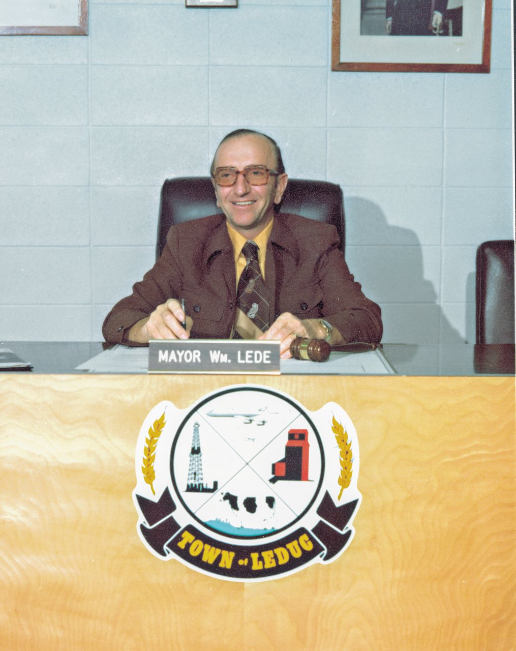 Man sitting behind desk