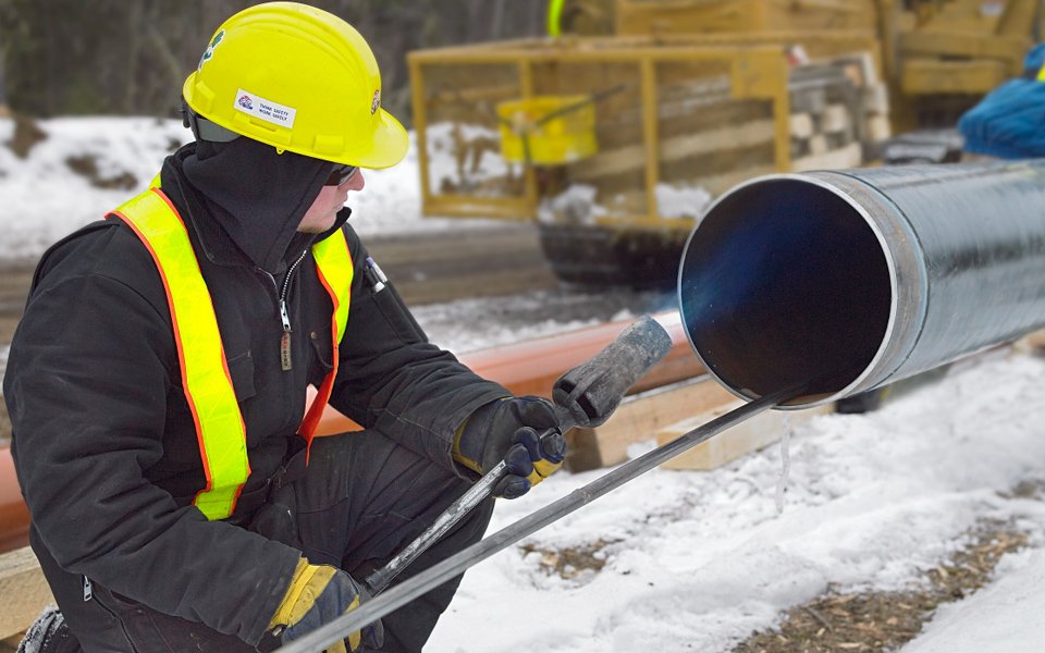 Ledcor worker on site.