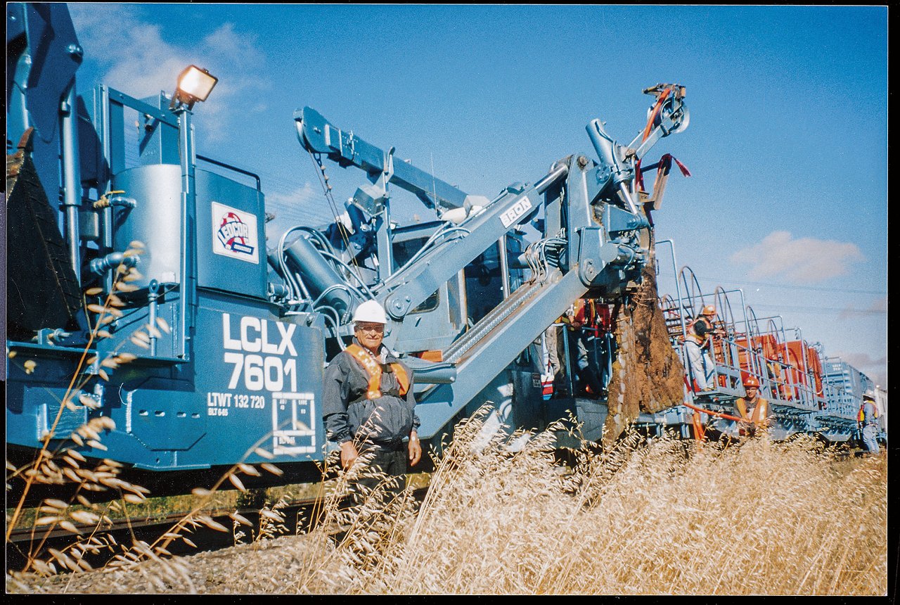 Man standing in front of machine 