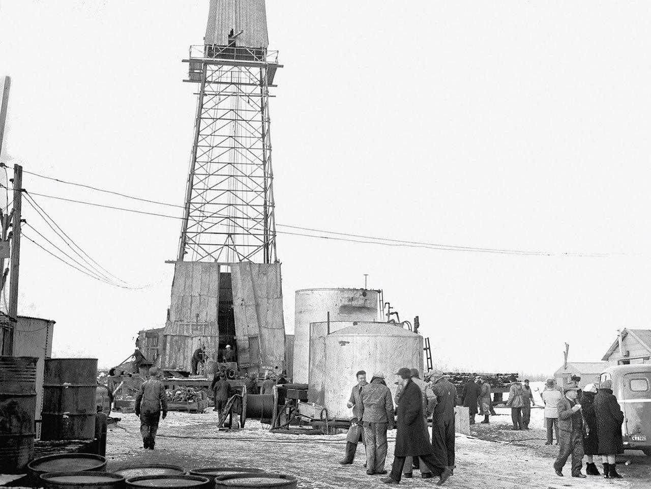 Men working around oil tower