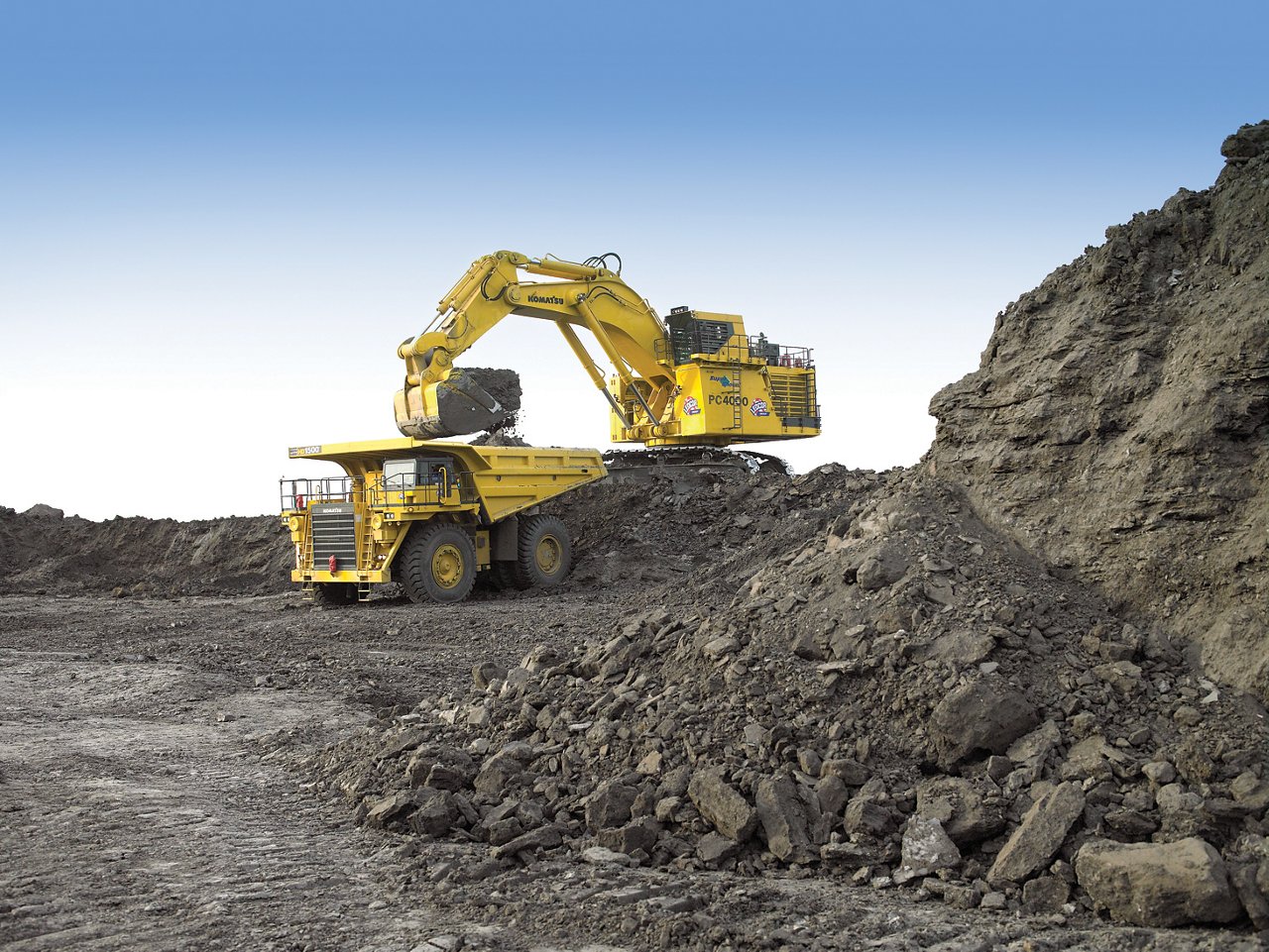 Excavator dumping the soil. 