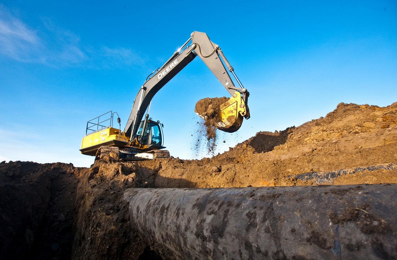 Excavator dumping the soil. 