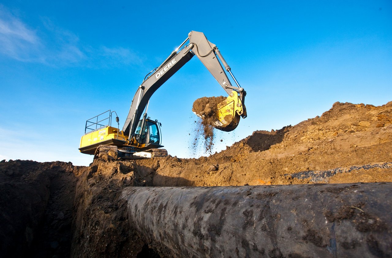 Excavator dumping the soil. 