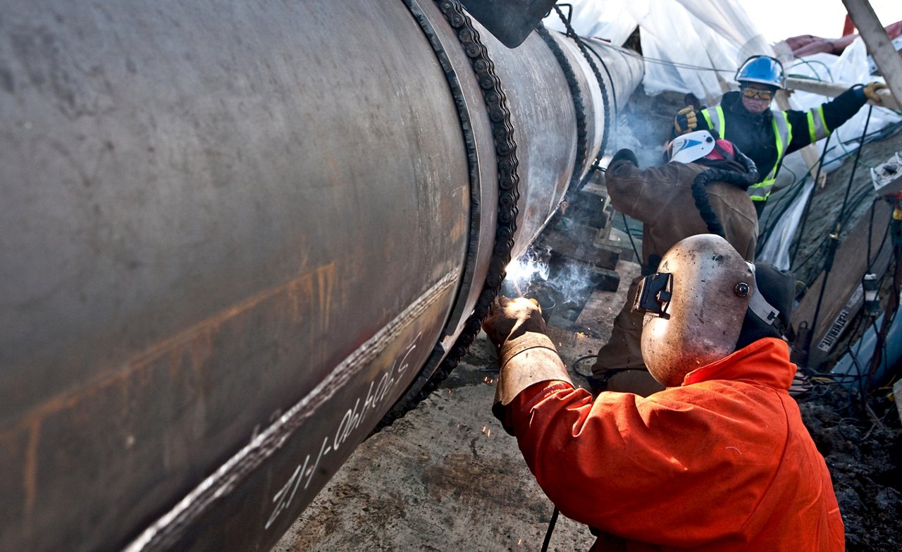 Welding the pipeline.
