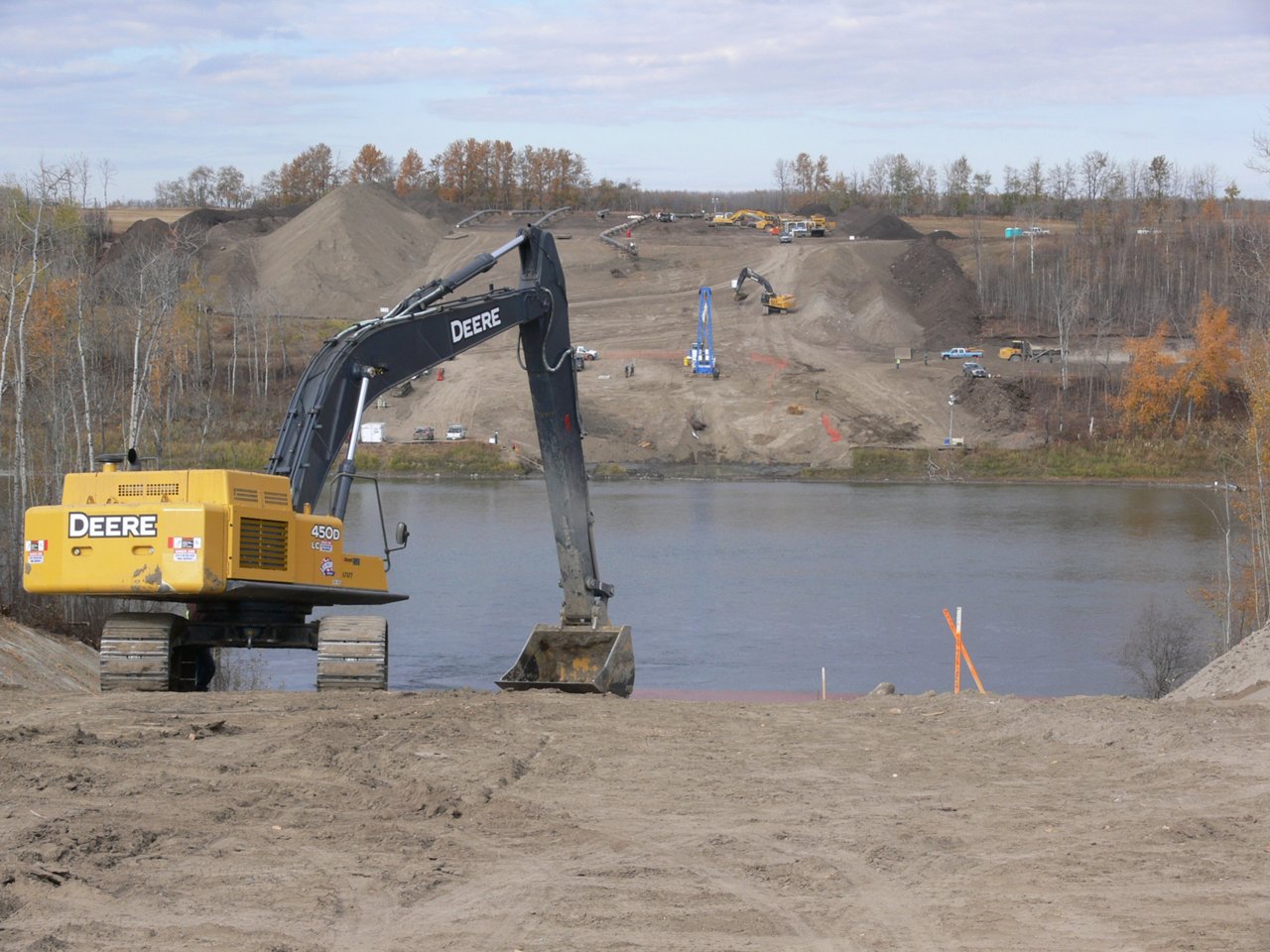 Excavator dumping the soil. 