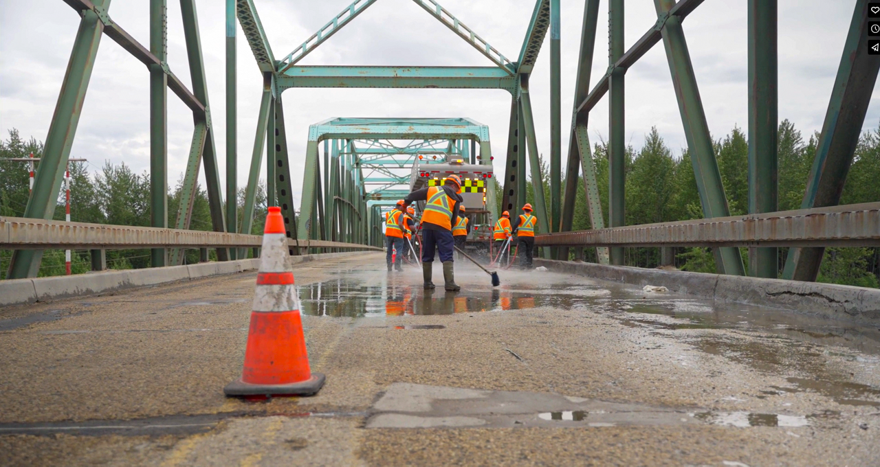 A picture of Ledcor crews cleaning a bridge