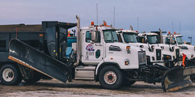 Ledcor Snow Plow Trucks at the site.
