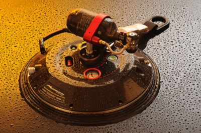 WinGrip All-in-One Vacuum Anchor for working safely at height on aircraft with air canister attached on wet surface.