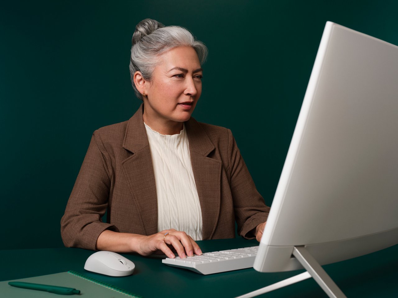 A coder focusing intently on her work.