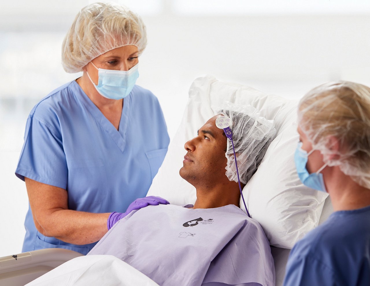 Preop patient in 3M™ Bair Hugger™ Universal Warming Gown. JPG File