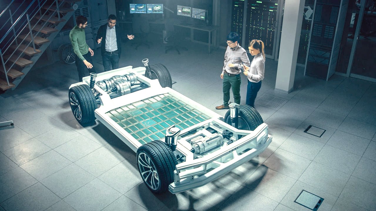 Automotive engineering team working on the chassis platform of an electric car, taking measurements, working with 3D CI software, analyzing efficiency. Vehicle structure with wheels, motor, and battery