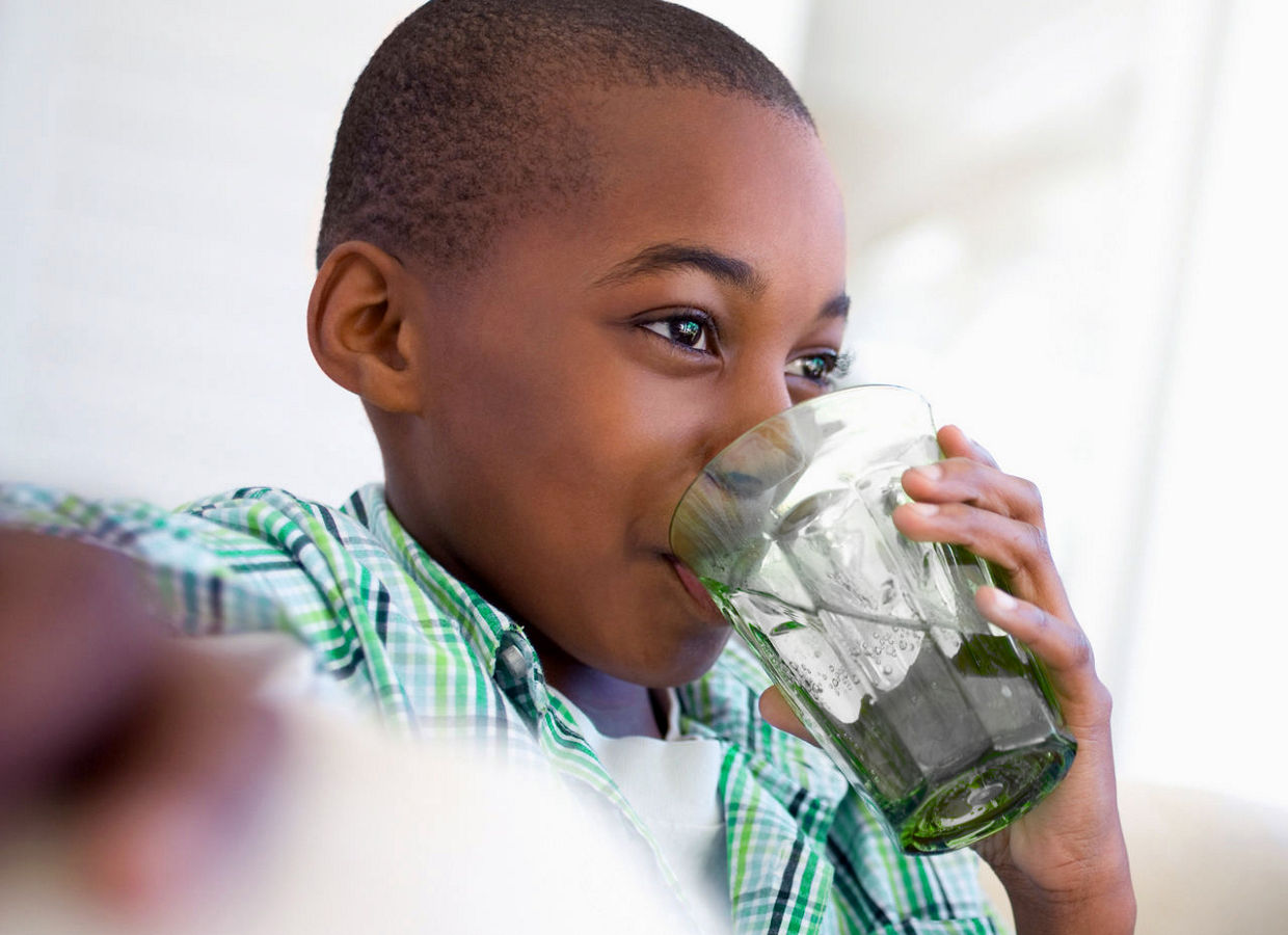 Little Boy Drinking Water