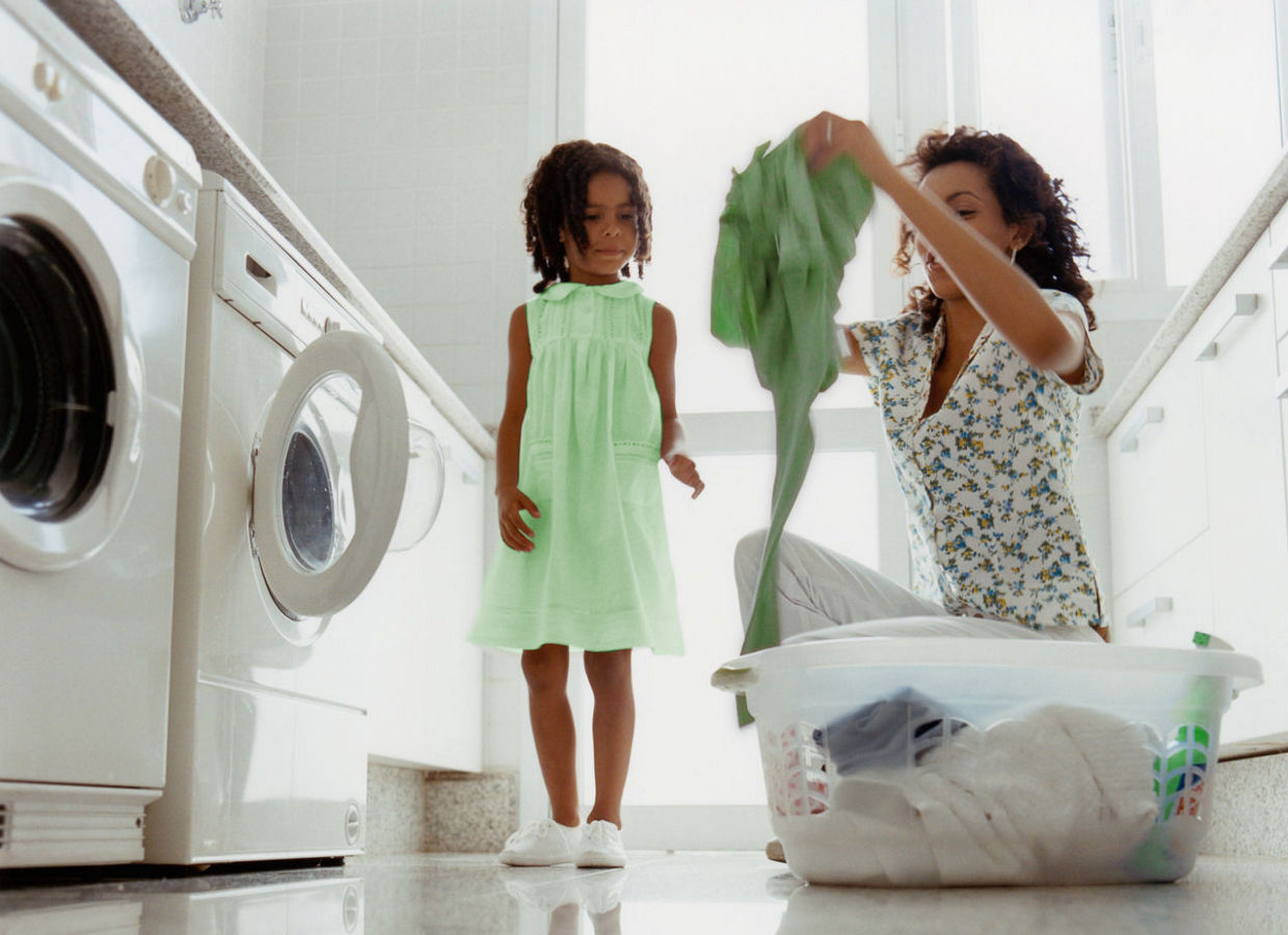 Girl Watches Mum Doing Laundry