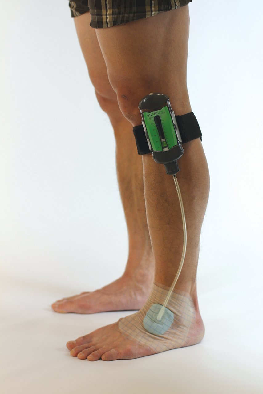 SNAP™ Therapy Strap, SNAP™ Therapy System, SNAP™ Geavanceerde Verbandsets, SNAP™ Therapiecartridge, groepsafbeelding bij beenapplicatie, cmyk, jpeg