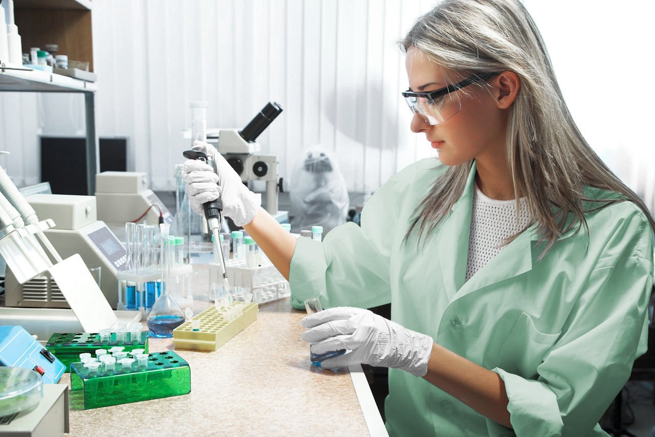 Beautiful woman working in modern laboratory