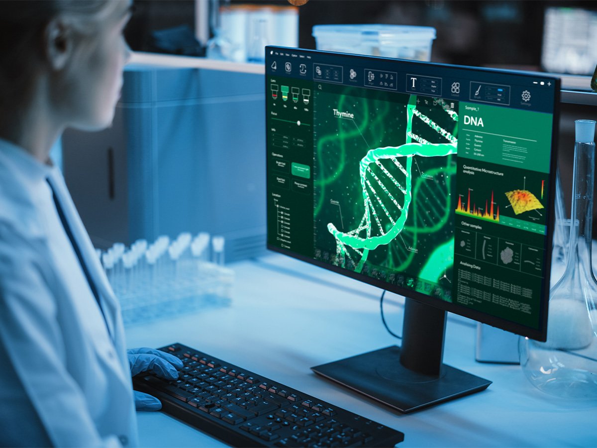 Medical Research Laboratory: Portrait of Female Scientist Working on Computer, Analysing DNA, Virus