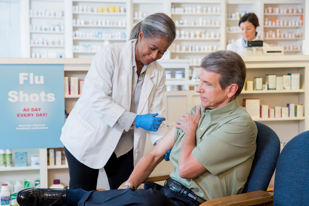 Doctor gives vaccine