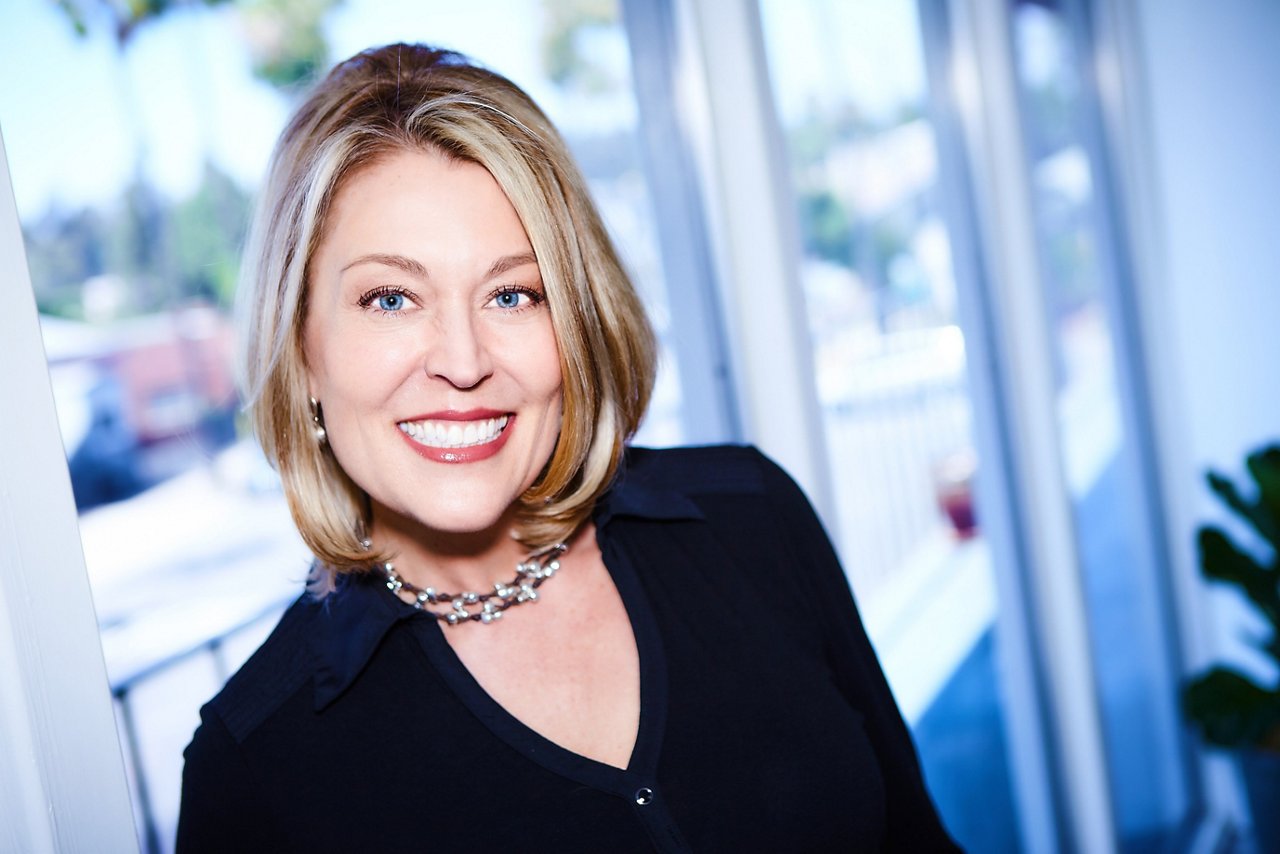 A headshot of Colette Carlson.