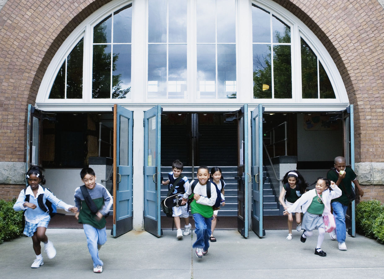 Elementary school children leaving school