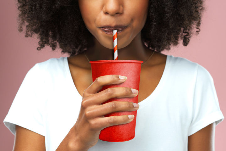 Woman drinking beverage