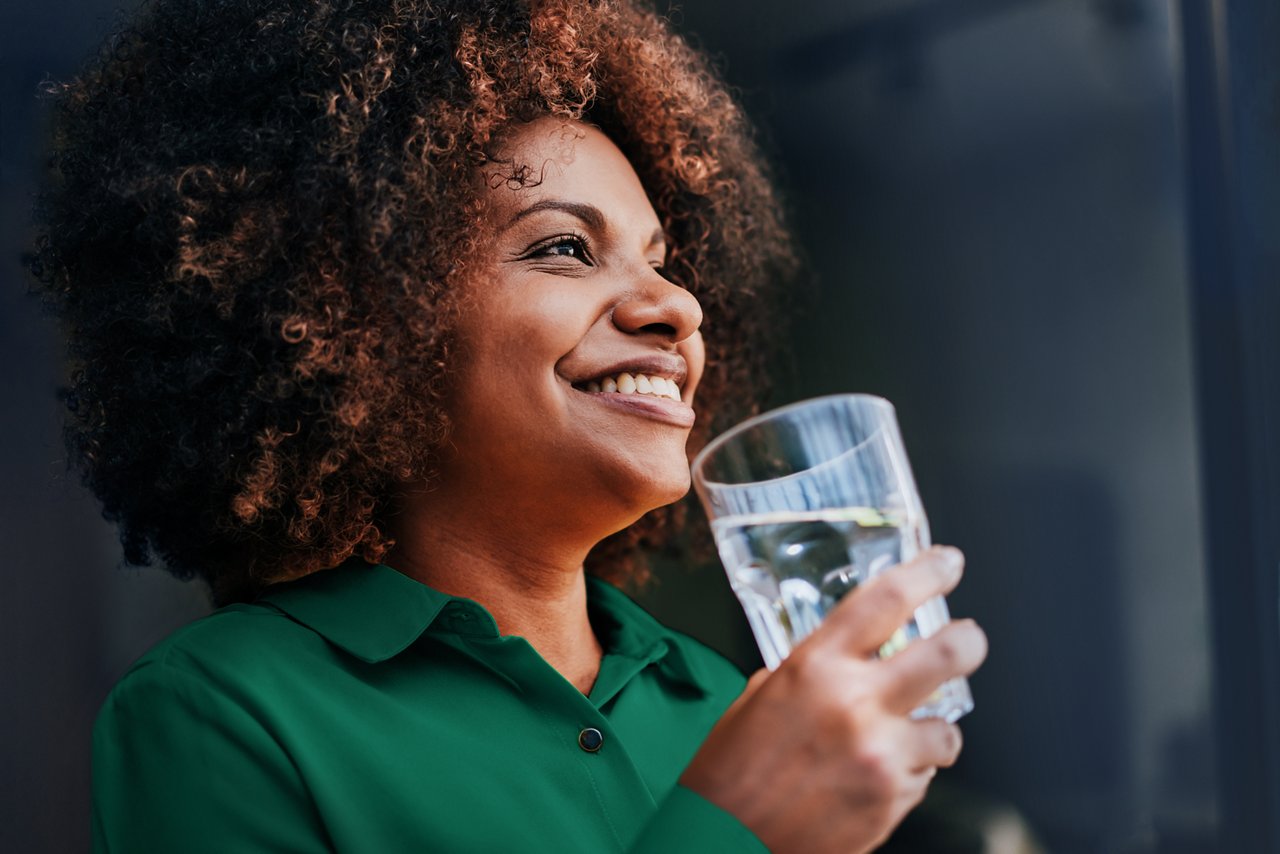 woman with glass of water