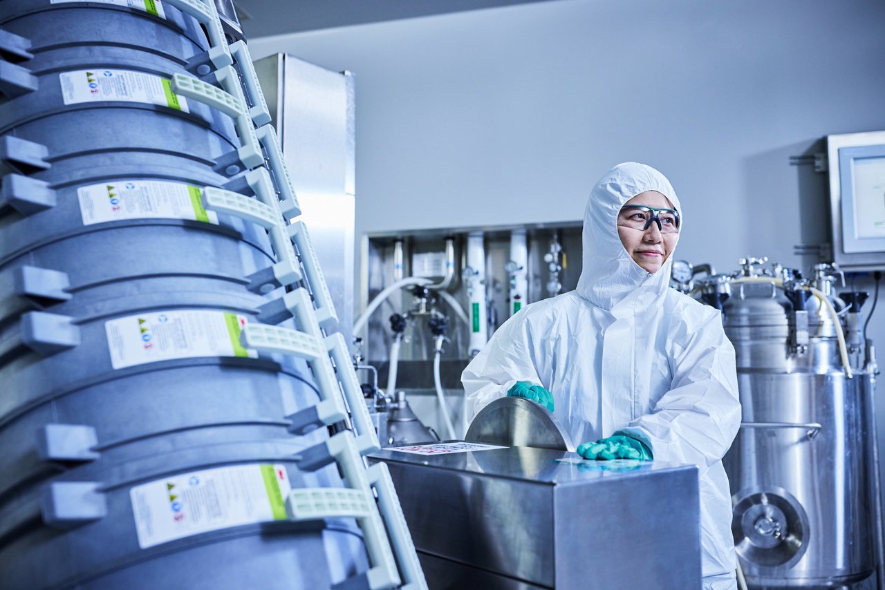 BTEC photoshoot 3M™ Harvest RC Centrate lab worker using wheel to elevate holder - 55