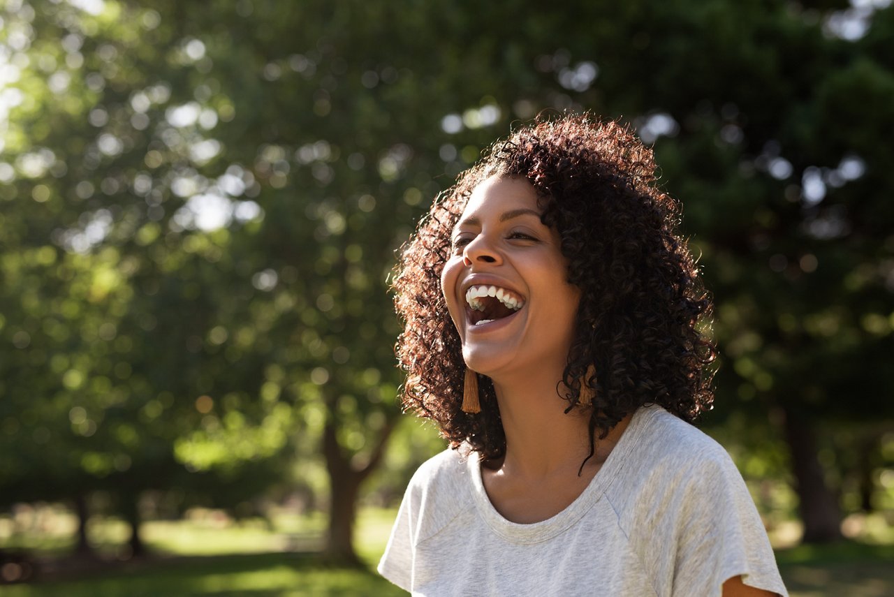 woman outside smiling