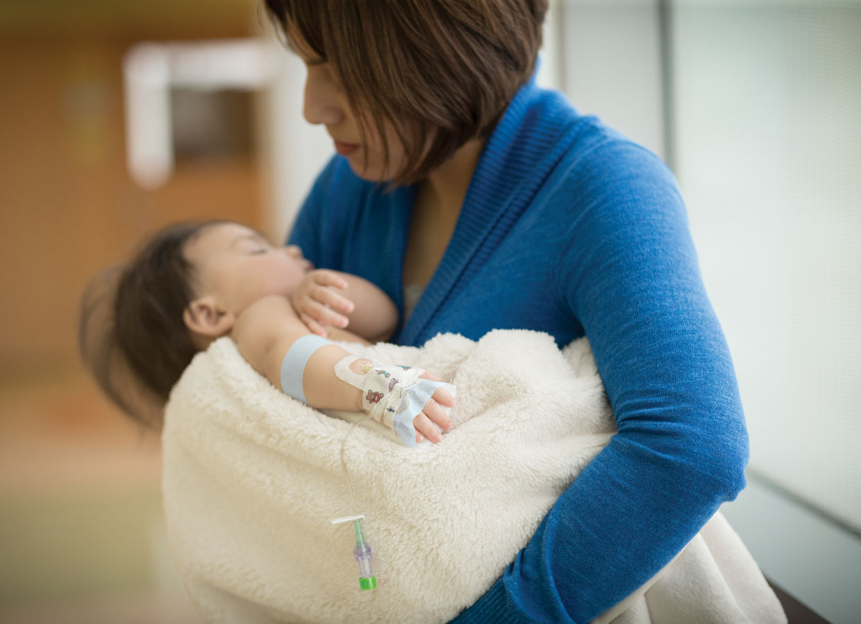 Picture of mother and baby with IV showing Micropores