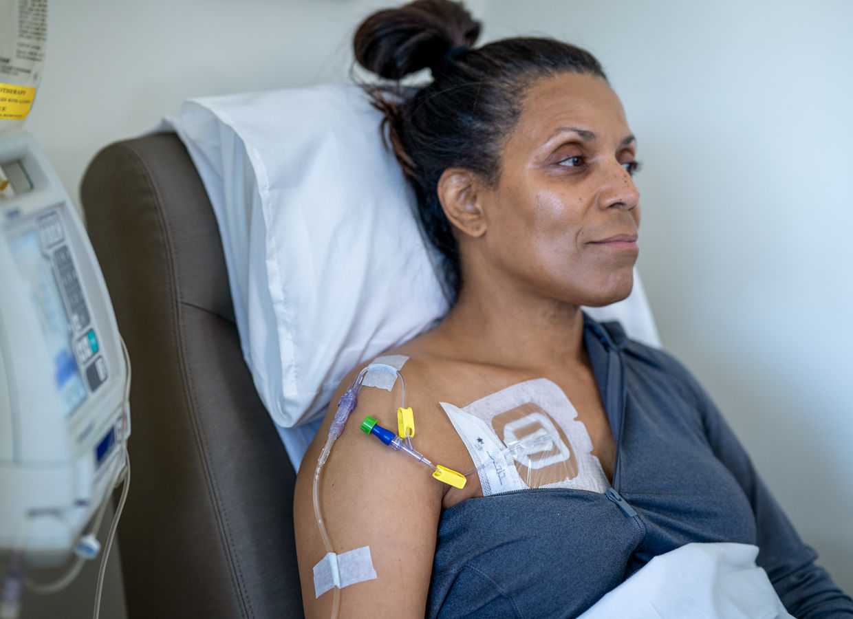 Oncology patient with Tegaderm 1665 over a port and patient looking ahead