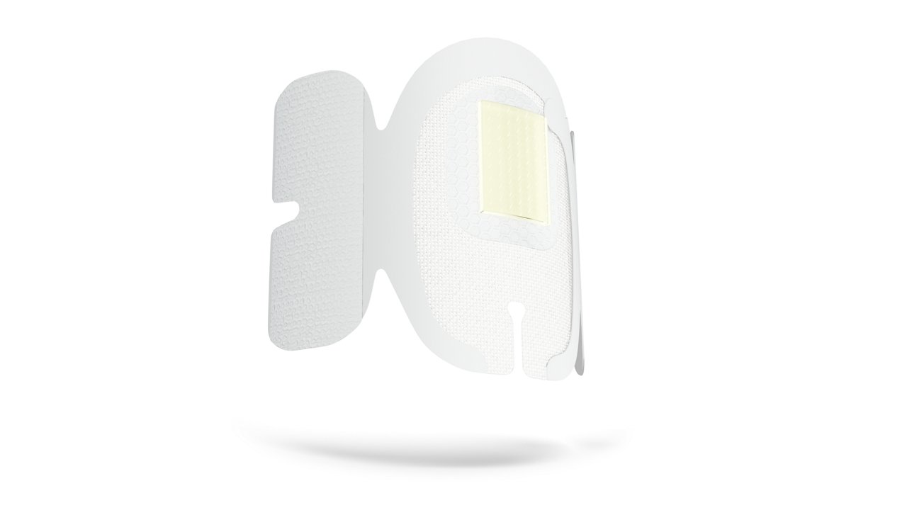 Rendered image of the 3M™ Tegaderm™ CHG Chlorhexidine Gluconate I.V. Securement Dressing from a 3/4 view