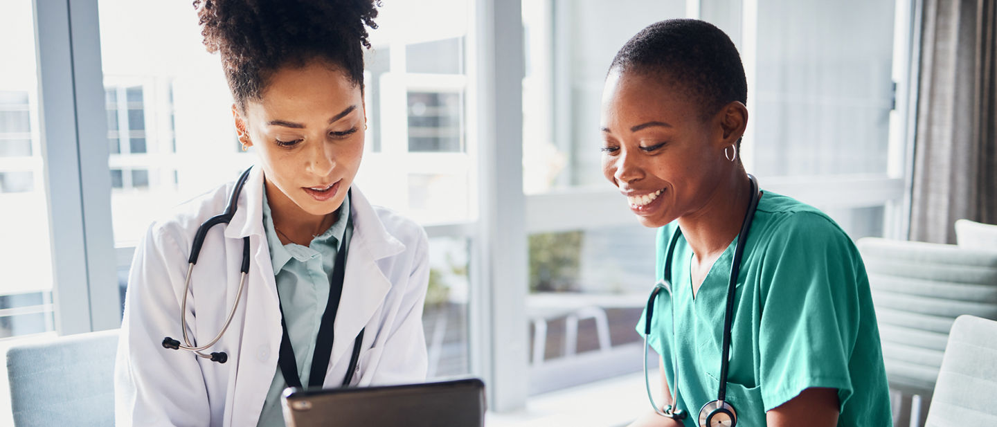 Tablet, black woman or doctors with medical research reading news or tests results in hospital together. Teamwork, digital tech or African nurses planning or speaking of healthcare report on website; Shutterstock ID 2269473511; purchase_order: Credit Card; job: Mark Bonesteel Brand Design; client: mwbonesteel1@mmm.com; other: USA