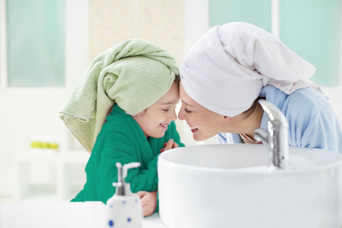 Mother and daughter in bathroom